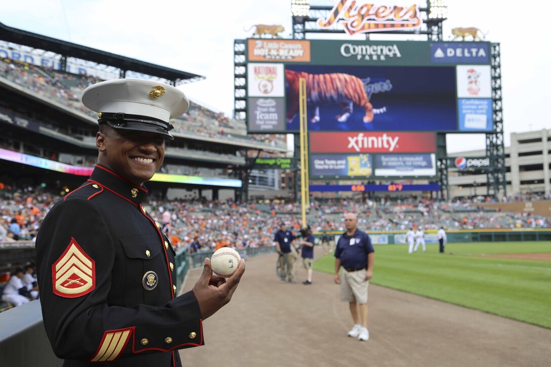 Staff Sgt. Michael Milliner prepares to deliver a Detroit Tigers game ball at Comerica Park June 21. Milliner, a Detroit native, is a Marine Corps recruiter out of Recruiting Sub-Station Warren, Mich.
