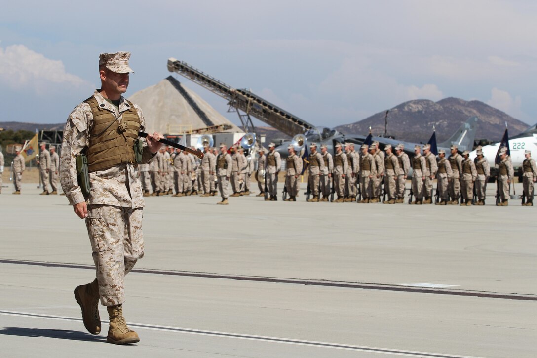 Sgt. Maj. Anthony A. Spadaro, the off-going 3rd Marine Aircraft Wing sergeant major, marches to his post during his relief ceremony aboard Marine Corps Air Station Miramar, Calif. July 12. Early in the ceremony, he relinquished his sword of office, symbolizing the end of his tour at 3rd MAW.