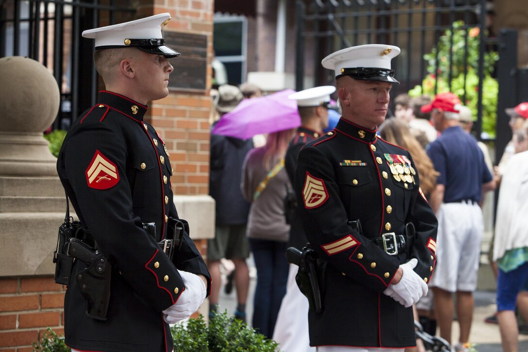 Marines with Guard Company, Marine Barracks Washington, D.C., stand post during a Friday Evening Parade at the Barracks July 12. 