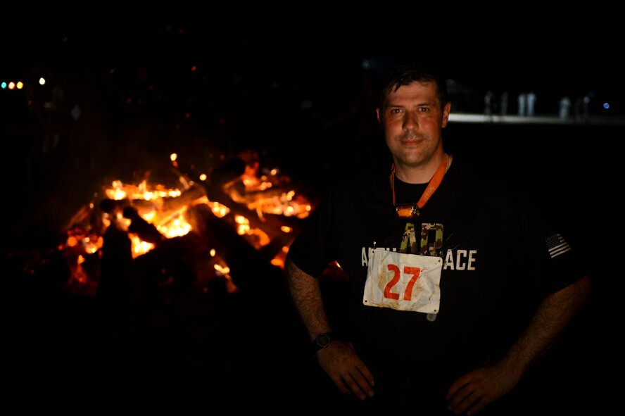 Col. Andrew Gebara, 2nd Bomb Wing commander, poses for a photo after completing an obstacle course on Barksdale Air Force Base, La., July 12, 2013. The event was held to boost morale and fitness for Barksdale Airmen and the local community. (U.S. Air Force photo/Senior Airman Micaiah Anthony)