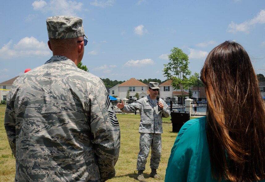 Col. Andrew Gebara, 2nd Bomb Wing commander, speaks during the groundbreaking ceremony of the East Reservation Community Center on Barksdale Air Force Base, La., July 12, 2013. The 3,150 square foot community center will include amenities such as a fitness area, activity room and kitchen. (U.S. Air Force photo/Airman 1st Class Andrew Moua)
