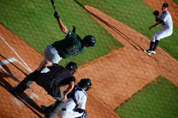 Evan Rutckyj, Charleston RiverDogs starting pitcher, delivers a strike to Ben Turner, Augusta GreenJackets player, during a Military Appreciation Night game July 13, 2013, at Joseph P. Riley Jr. ballpark in Charleston, S.C. The GreenJackets defeated the RiverDogs 4 – 1. (U.S. Air Force photo/ Staff Sgt. Anthony Hyatt)