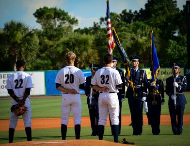 The Joint Base Charleston Honor Guard posts the colors during Military Appreciation Night July 13, 2013, at the Joseph P. Riley Jr. ballpark in Charleston, S.C. During Military Appreciation Night, all military personnel, support staff and dependents were admitted free with a military identification card. (U.S. Air Force photo/Staff Sgt. Anthony Hyatt)