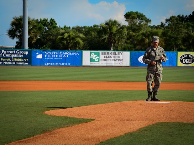 Col. James Hurley, 315th Mission Support Group commander, prepares to throw the ceremonial first pitch during Military Appreciation Night July 13, 2013, at the Joseph P. Riley Jr. ballpark in Charleston, S.C. The Charleston RiverDogs hosted Military Appreciation Night to show their support for the local military. (U.S. Air Force photo/ Staff Sgt. Anthony Hyatt)