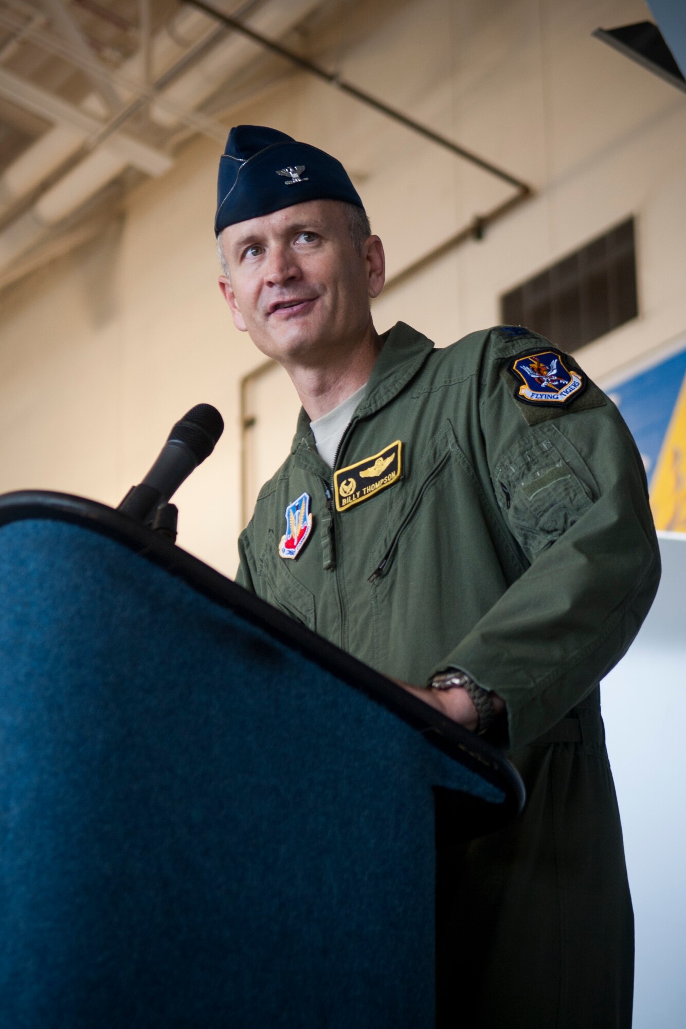 U.S. Air Force Col. Billy Thompson, outgoing 23d Wing commander, gives a speech during a change of command ceremony at Moody Air Force Base, Ga., July 12, 2013. Thompson relinquished command after two years of service.  (U.S. Air Force Photo by Airman 1st Class Sandra Marrero/released)
