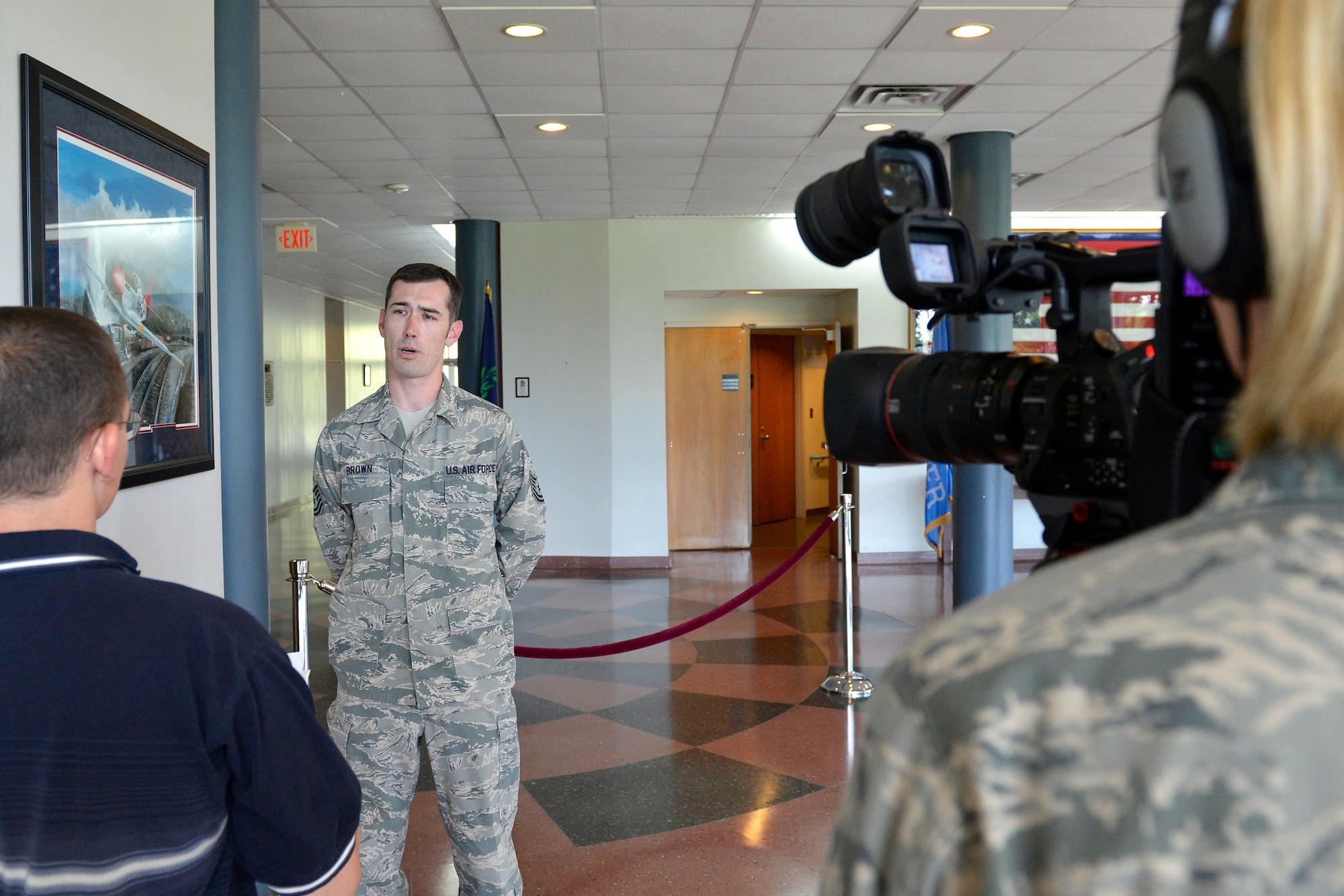 MCGHEE TYSON AIR NATIONAL GUARD BASE, Tenn. – Tech. Sgt. Michael Brown, a public affairs specialist with the 141st Air Refueling Wing at Fairchild Air Force Base, Wash., speaks with mock media here reacting to a simulated downed aircraft July 12, 2013, during the I.G. Brown Training and Education Center’s Public Affairs Managers Course. (U.S. Air National Guard photo by Master Sgt. Kurt Skoglund/Released)