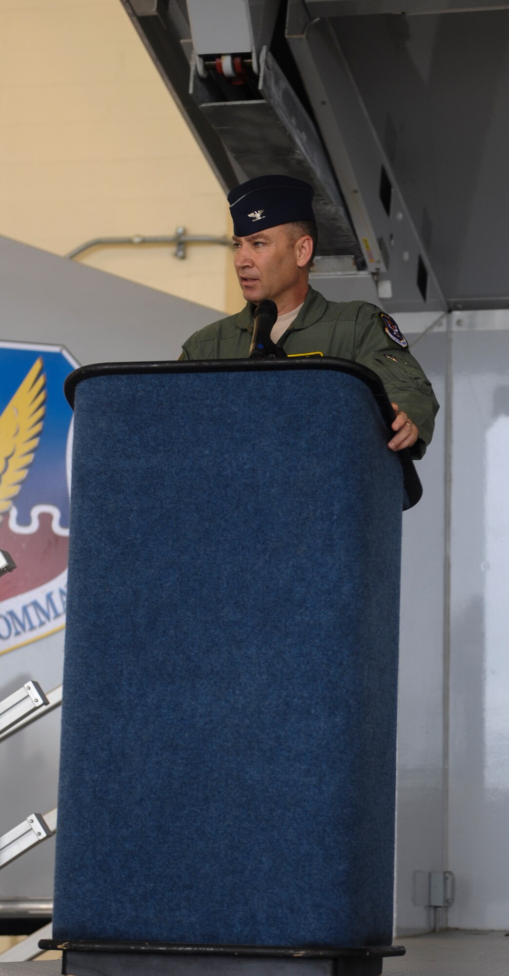 U.S. Air Force Col. Chad Franks, incoming 23d Wing commander, gives a speech during a change of command ceremony at Moody Air Force Base, Ga., July 12, 2013. Franks is returning to Moody where he was previously the 347th Rescue Group commander from July 2010 to July 2012. (U.S. Air Force photo by Airman Alexis Grotz/Released)