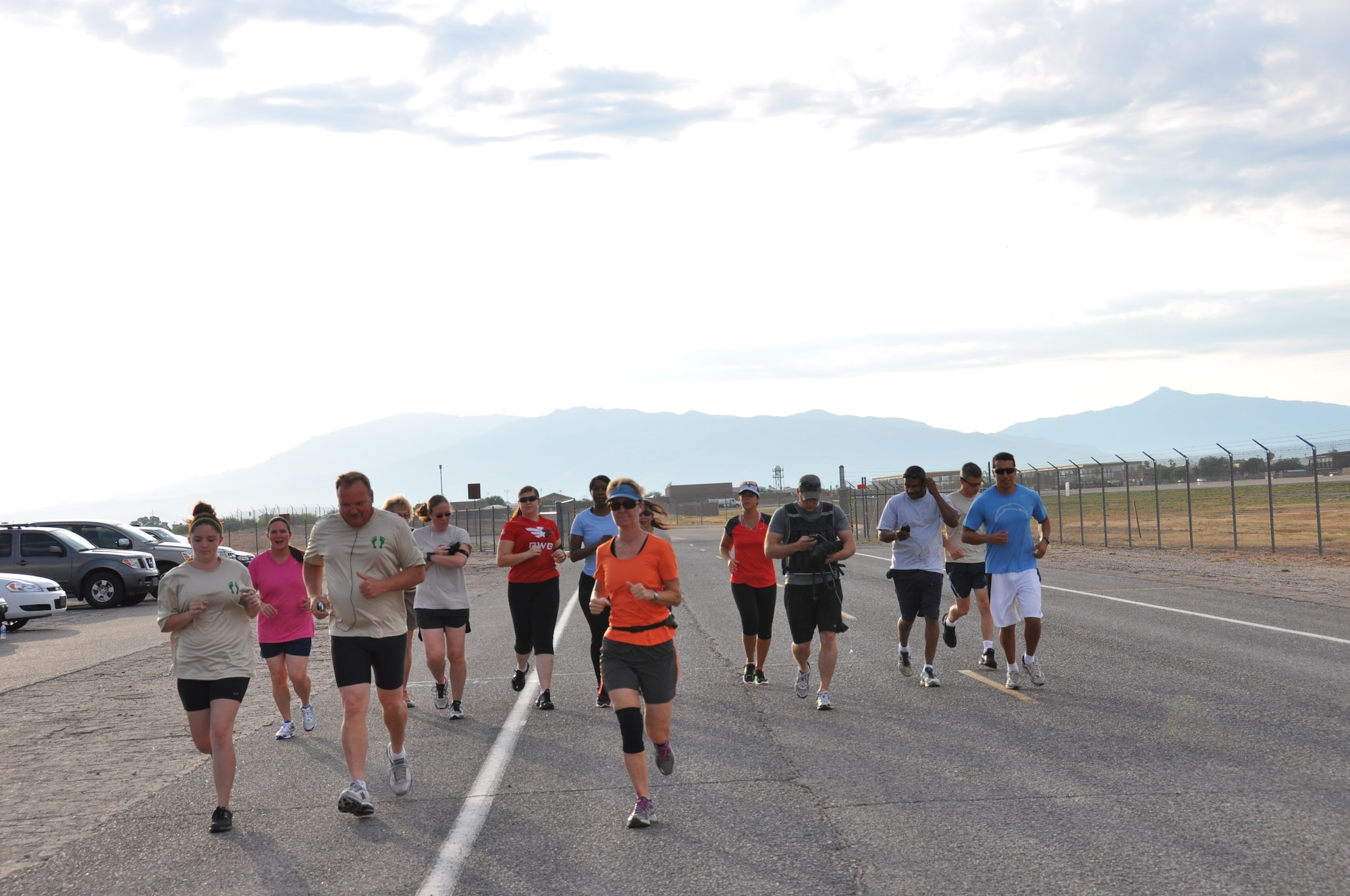 A small group of 943rd Rescue Group Airmen braved the heat and humidity to participate in the 943rd RQG Top Three July 5K Fun Run on Sunglow Road during the July UTA weekend.  (U.S. Air Force photo/ Tech Sgt. Carlos J. Treviño)