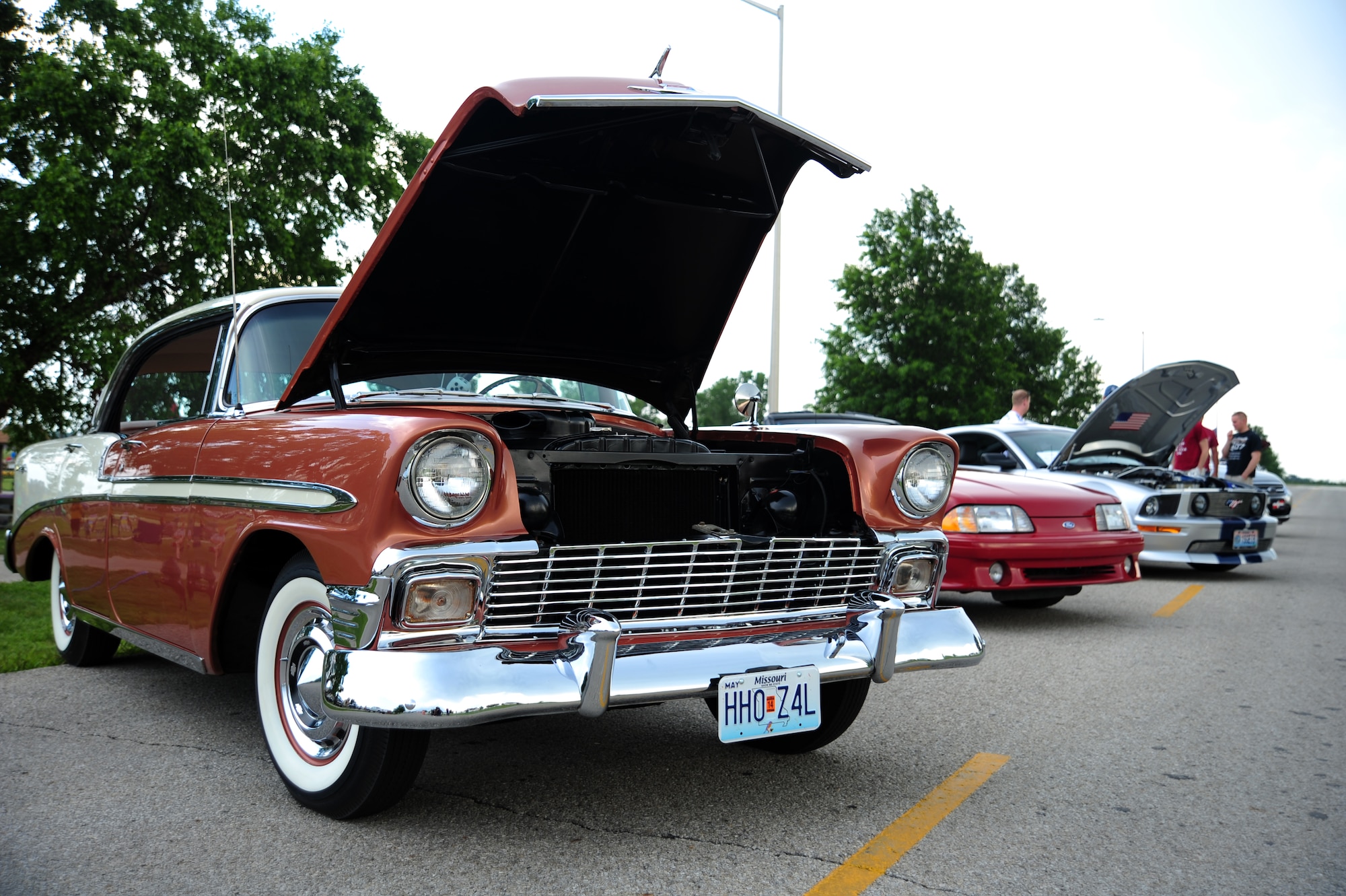 Vehicles are showcased during a car show for members of Team Whiteman to view during a 4th of July celebration at Whiteman Air Force Base, Mo., July 3, 2013. Base members and their families took part in the celebration, which was hosted by the 509th Force Support Squadron. (U.S. Air Force photo by Staff Sgt. Nick Wilson/Released)