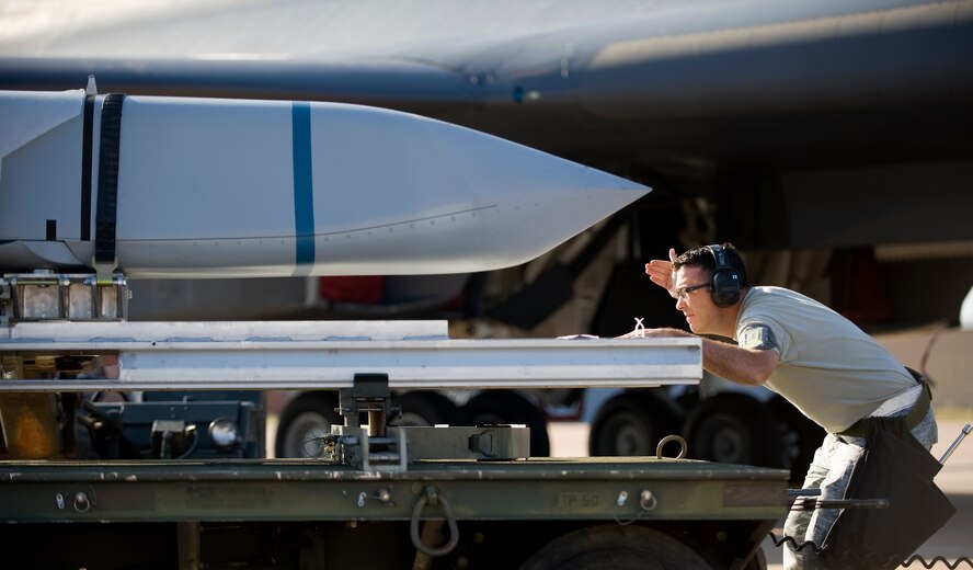 U.S. Air Force Master Sgt. Troy Drasher, 7th Maintenance Group, inspects a Long Range Anti-Ship Missile (LRASM) prior to being loaded onto a B-1 Bomber June 12, 2013, at Dyess Air Force Base, Texas. The LRASM is based on the Joint Air to Surface Standoff Missile Extended Range, but incorporates a multi-mode radio frequency sensor, a new weapon datalink and altimeter and an uprated power system. However, it has a reduced range than the JASSM-ER, similar to that of the original JASSM. (U.S. Air Force photo by Airman 1st Class Damon Kasberg/Released)