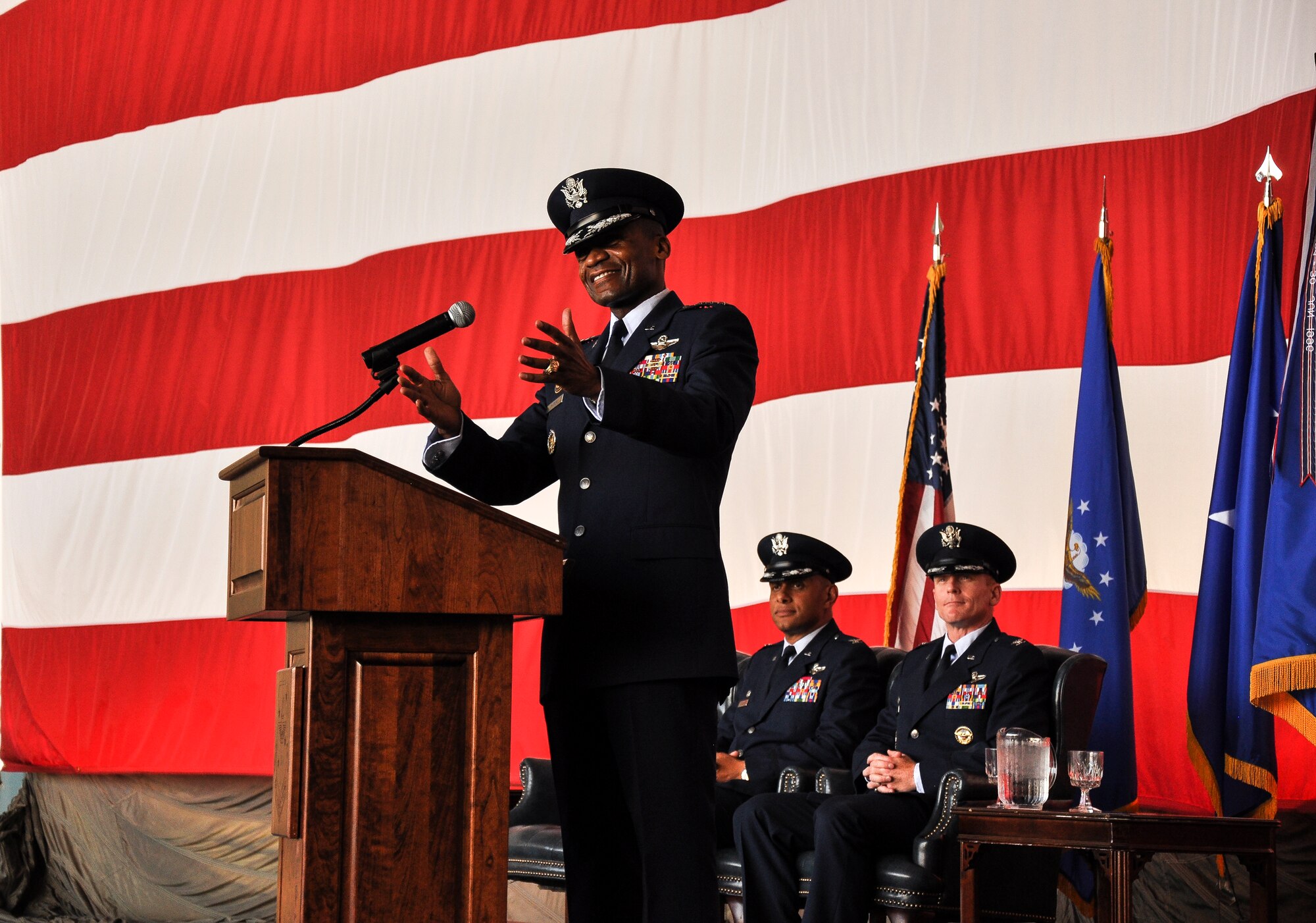 Lt. Gen. Darren McDew, 18th Air Force commander, speaks at the 19th Airlift Wing change of command ceremony July 9, 2013, at Little Rock Air Force Base, Ark. The ceremony saw Col. Brian Robinson relinquish command of the host unit of Little Rock Air Force Base to Col. Patrick Rhatigan. (U.S. Air Force photo by Staff Sgt. Jake Barreiro)
