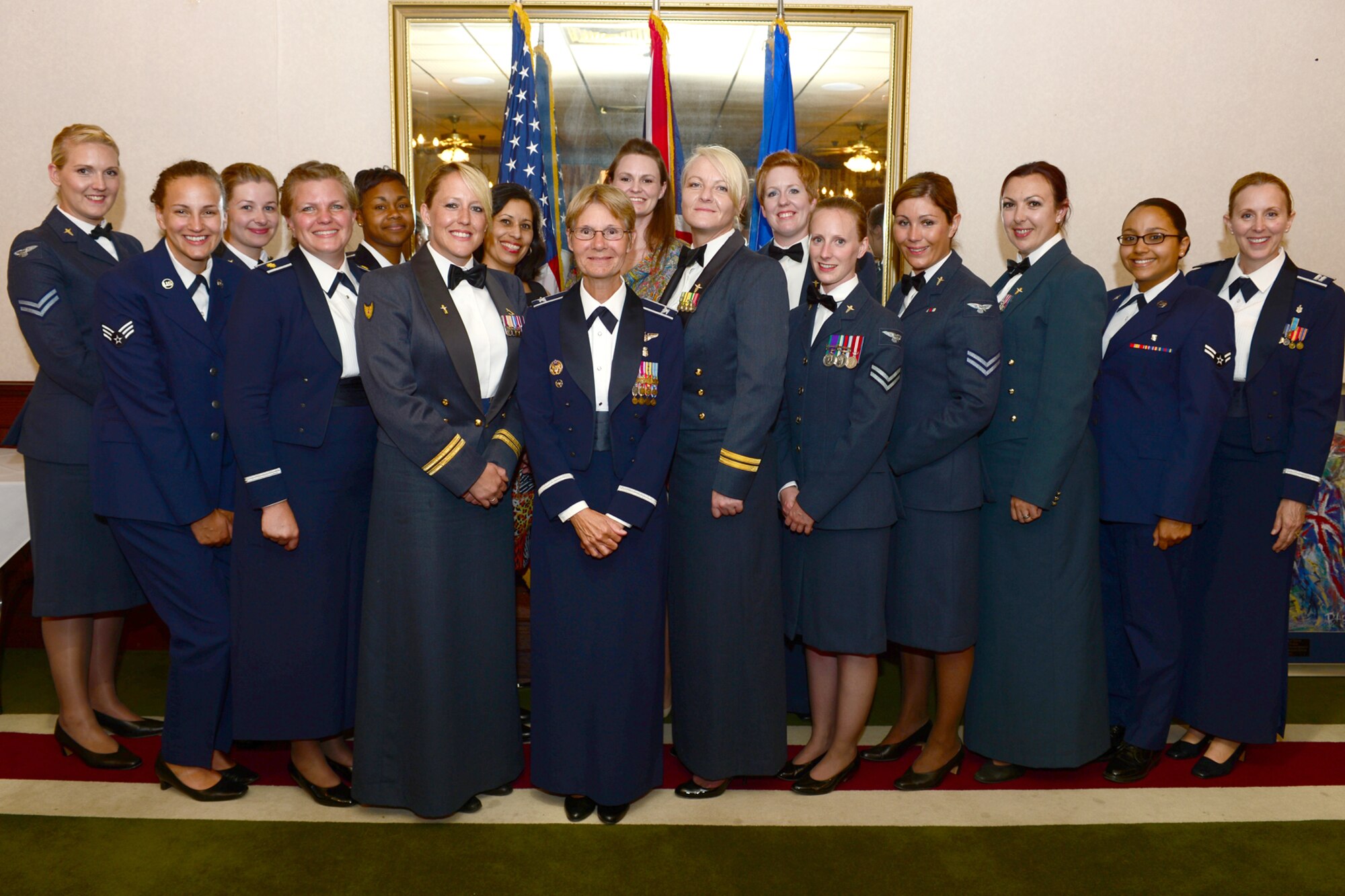 ROYAL AIR FORCE LAKENHEATH, England – Liberty Wing nurses and local Royal Air Force nurses pose for a picture during at the RAF Lakenheath U.S. and U.K. Air Force Nursing Research Dinner July 8, 2013. The nurses came together for a research evidence practice-based event to start collaboration and sharing of ideas across the two services. (U.S. Air Force photo by Airman 1st Class Dana J. Butler)