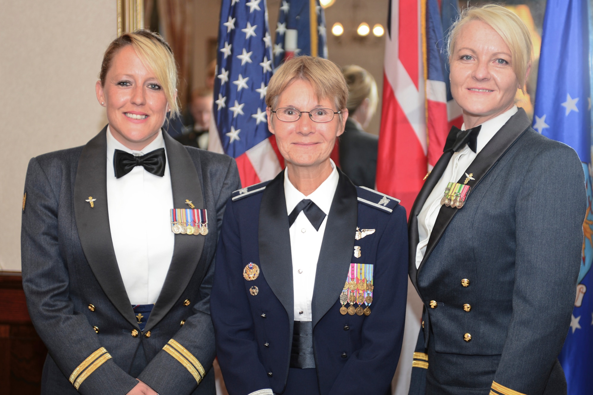 ROYAL AIR FORCE LAKENHEATH, England – Royal Air Force Flt. Lt. Sherry Conway, RAF Henlow Center of Aviation Medicine aeromedical evacuation research officer, U.S. Air Force Col. Lynne Taylor, 48th Medical Group chief nurse, and RAF Flt. Lt. Jenelle Kerr, Ministry of Defence Hospital Unit Peterborough lead military nurse trauma and orthopedic ward, pose for a picture at the RAF Lakenheath U.S. and U.K. Air Force Nursing Research Dinner July 8, 2013. The nurses came together for a research evidence practice-based event to start collaboration and sharing of ideas across the two services. (U.S. Air Force photo by Airman 1st Class Dana J. Butler)