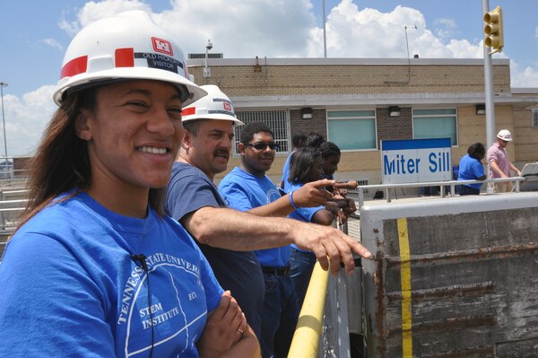 (Center) Chris Sherek, an Old Hickory Hydropower trainee at the Old Hickory Lock and Dam from the Nashville District provides students Jessica Dedeaux from Wiggins, Miss., and John Fitzgerald, Jr., from Memphis, Tenn with information about the operations of the Old Hickory Lock and Dam on June 27, 2013.  Both were part of a group of 17 students who attended the Tennessee State University Engineering Department's four-week National Summer Transportation Institute program that introduces students to various aspects of engineering.  Both Dededaux and Fitzgerald plan to attend Tennessee State University and study Engineering.  


