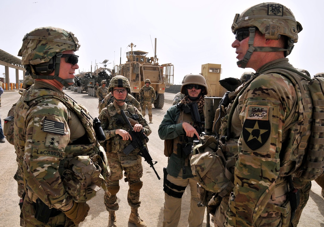 U.S. Army Maj. Gen. Paul J. LaCamera, left, the new commander of ...