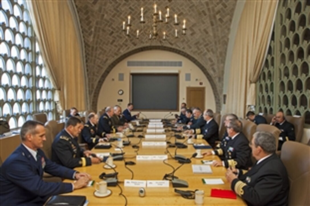 U.S. Army Gen. Martin E. Dempsey, chairman of the Joint Chiefs of Staff, meets with Mexican leaders army Gen. Salvador Cienfuegos Zepeda, defense secretary, and navy Adm. Vidal Francisco Soberon Sanz, navy secretary, for the U.S.-Mexico Defense Chiefs Strategy Dialogue at the National Defense University on Fort McNair in Washington D.C., July 15, 2013. 