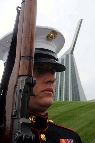 Lance Cpl. Eric Mcgensen, member of the Marine Silent Drill Platoon, practices drill moves before a performance at the National Museum of the Marine Corps on July 12, 2013. The routine was part of a Summer Concert Series hosted by the Marine Corps Heritage Foundation.