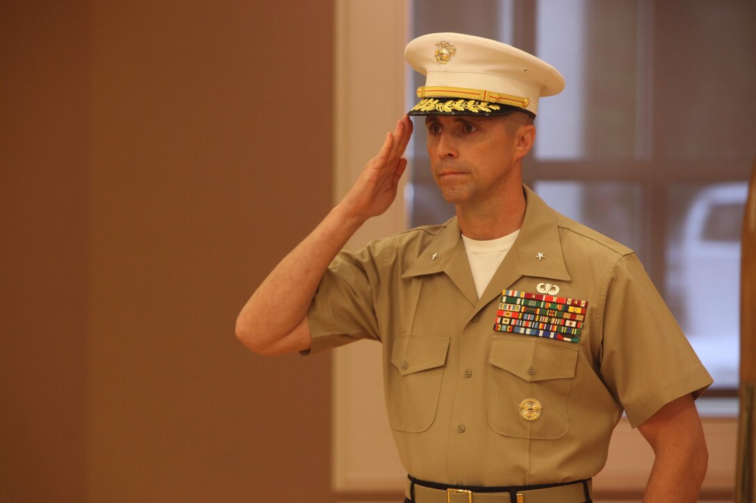 Brig. Gen. Robert F. Castellvi, commanding General of Marine Corps Installations-East, Marine Corps Base Camp Lejeune, salutes before his speech at the MCIEAST Change of Command at the Marston Pavilion aboard MCB Camp Lejeune, July 12. Castellvi assumed command from Brig. Gen. Thomas A. Gorry. (Photo by Lance Cpl. Justin A. Rodriguez/released)