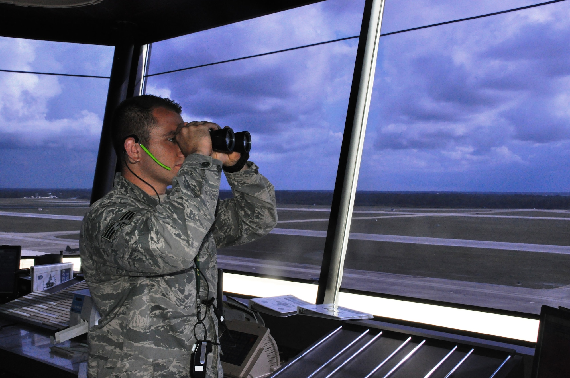 Senior Airman Justin Loranger, 325th OSS air traffic controller, performs some of his duties at the unit’s air traffic control tower. He is the 2012 Air Force Air Traffic Controller award recipient. (U.S. Air Force photo by Senior Airman Christopher Reel) 