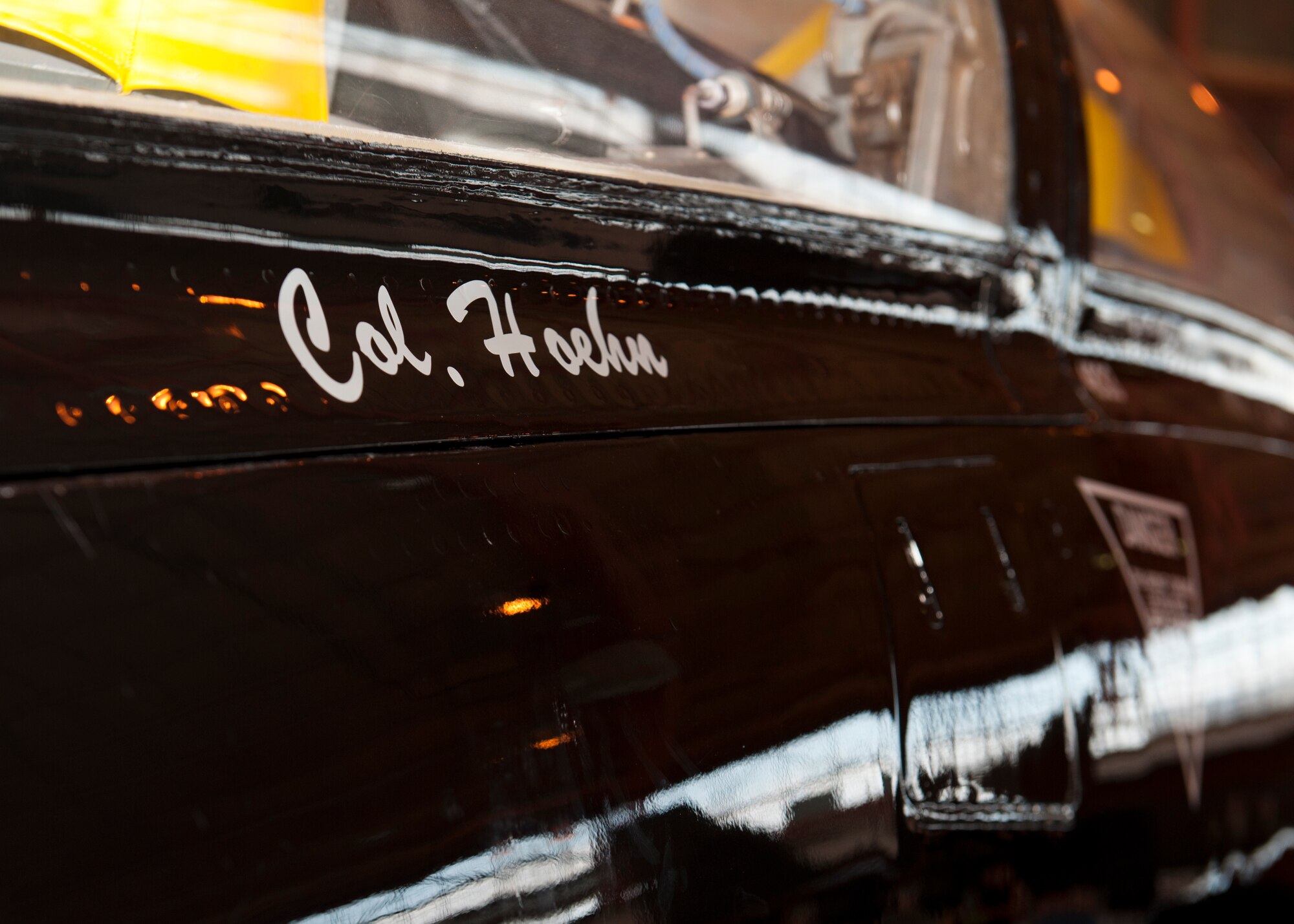 Colonel Mark Hoehn, 49th Operations Group incoming commander, has his name unveiled on a T-38 Talon during the 49th Operations Group change of command ceremony at Holloman Air Force Base, N.M., June 12. In the ceremony Col. Mark Hoehn assumed command of the 49th OG from Col. Kenneth Johnson. The group is home to the Air Force’s most combat-ready F-22 Raptor squadron and is a formal training unit for MQ-1 Predator and MQ-9 Reaper aircrew, graduating around 700 crews per year. (U.S. Air Force photo by Airman 1st Class Daniel E. Liddicoet/Released)

