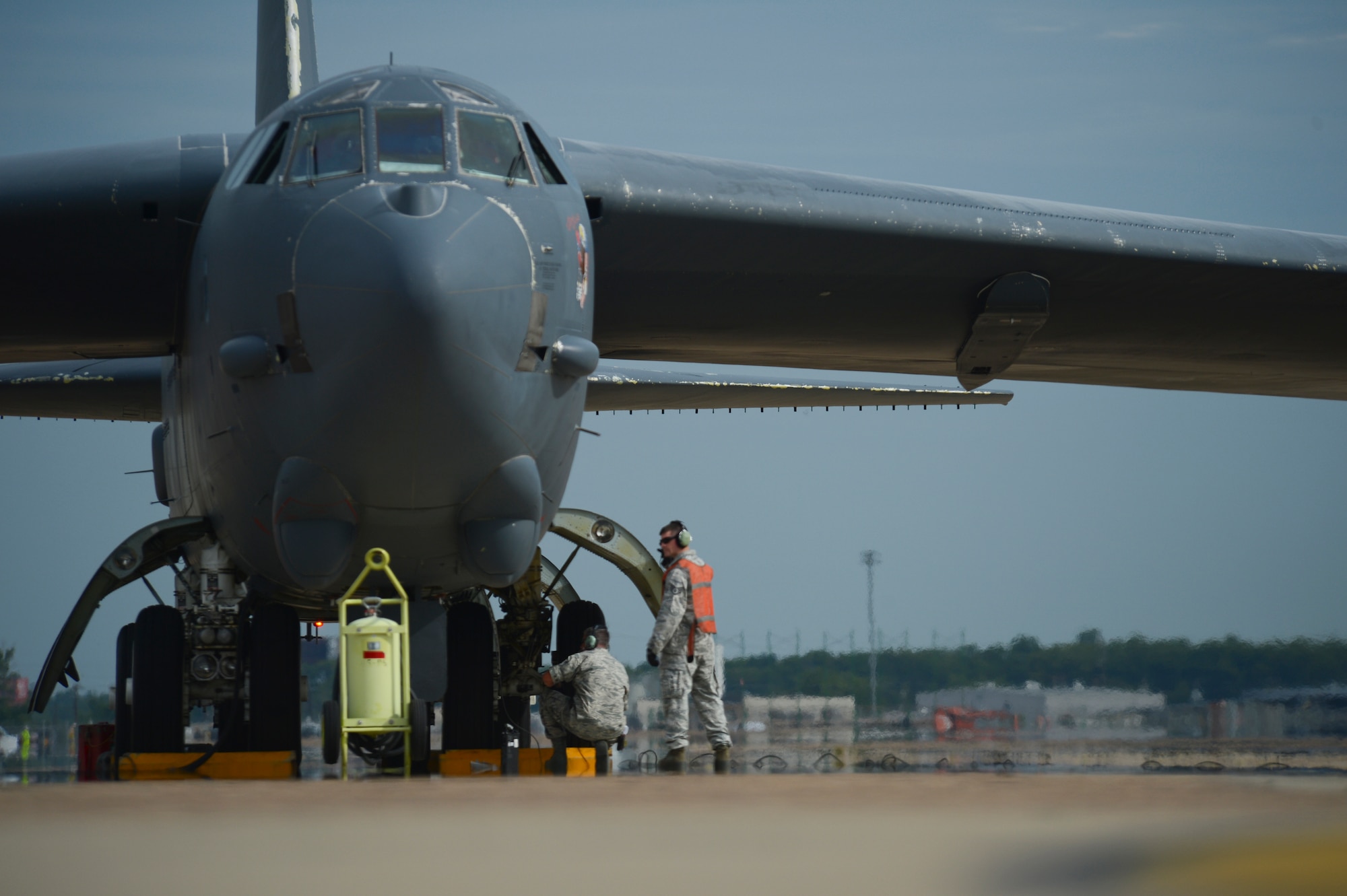 Tech. Sgt. Michael Zeigler, 96th Aircraft Maintenance Unit, and Staff Sgt. Aaron McCullum, 2nd Aircraft Maintenance Squadron, prepare to launch a B-52H Stratofortress on Barksdale Air Force Base, La., July 16, 2013. The B-52 was sent to Tinker Air Force Base, Okla., to receive the first Combat Network Communications Technology upgrade. The change will allow aircrew to receive real-time intelligence updates. (U.S. Air Force photo/Senior Airman Micaiah Anthony) 