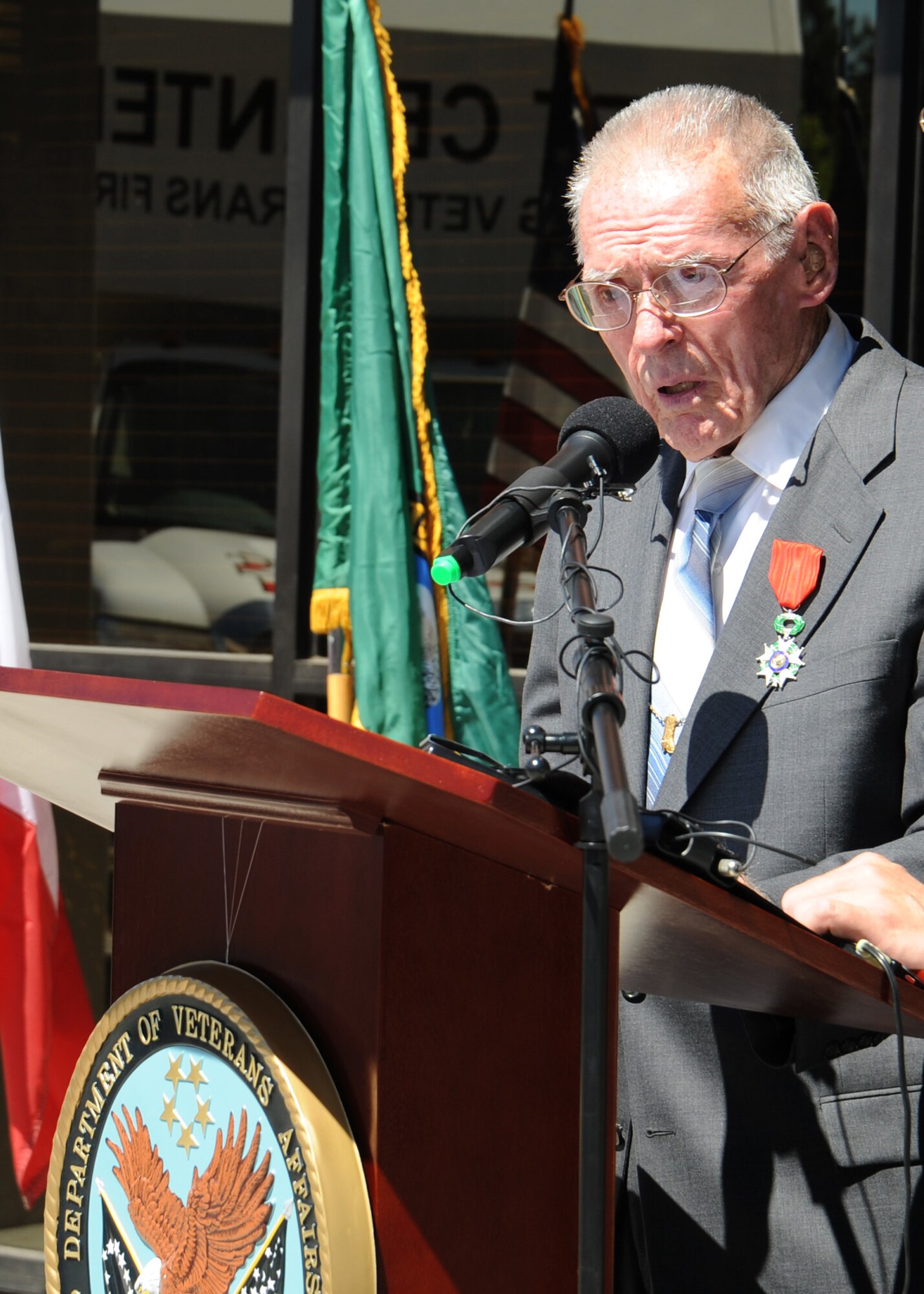 Mr. Del Casper, WWII Army Air Corps B-17 gunner, speaks during a ceremony awarding him the French Legion of Honor medal at the Spokane Veterans Center in Spokane Valley, Wash., July 15, 2013.  Casper received the medal for his bravery in 35 bombing missions over German-occupied Europe.  (U.S. Air Force photo by Senior Airman Samantha Krolikowski/Released)