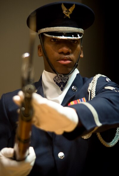 U.S. Air Force Senior Airman Marcus Davis, Air Force Honor Guard ceremonial guardsman, holds out the bayonet on his rifle July 15, 2013, at Dyess Air Force Base, Texas. Ceremonial Honor Guardsmen set aside their career to join the Air Force’s Honor Guard and devote themselves to representing the past, present and future of the Air Force. (U.S. Air Force photo by Airman 1st Class Peter Thompson/Released)