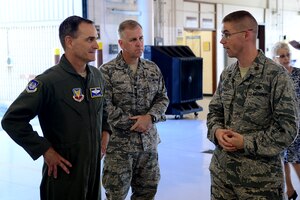 U.S. Air Force Maj. Gen. H.D.  Polumbo Jr., 9th Air Force commander, meets with Maj. Gregory Boschert, 633rd Logistics Readiness Squadron commander, during a base tour at Langley Air Force Base, Va., July 15, 2013.  Polumbo made several stops around Joint Base Langley-Eustis, Va., as part of his two-day tour. (U.S. Air Force photo by Senior Airman Kayla Newman/Released)