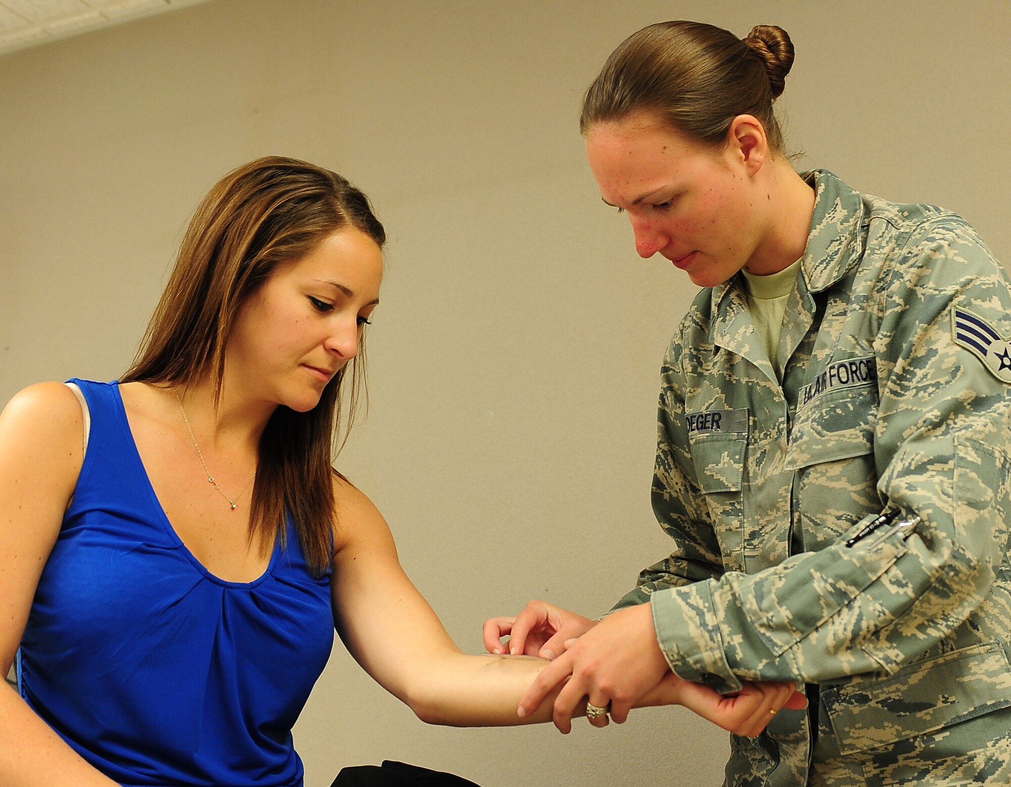 The 5th Medical Group immunizations clinic provides routine and deployment vaccines to all eligible beneficiaries. This includes civilians and contractors who are authorized care. The immunization clinic maintains a stock of all routine vaccines, as well as some travel-specific vaccines. The Mission of the 5th MDG is to deliver compassionate, seamless, family-centered health care to ensure medically reliable and effective mission-ready forces for the 5th Bomb Wing, 91st Missile Wing, and tenant units. (U.S. Air Force photo/Airman 1st Class Kristoffer Kaubisch)
