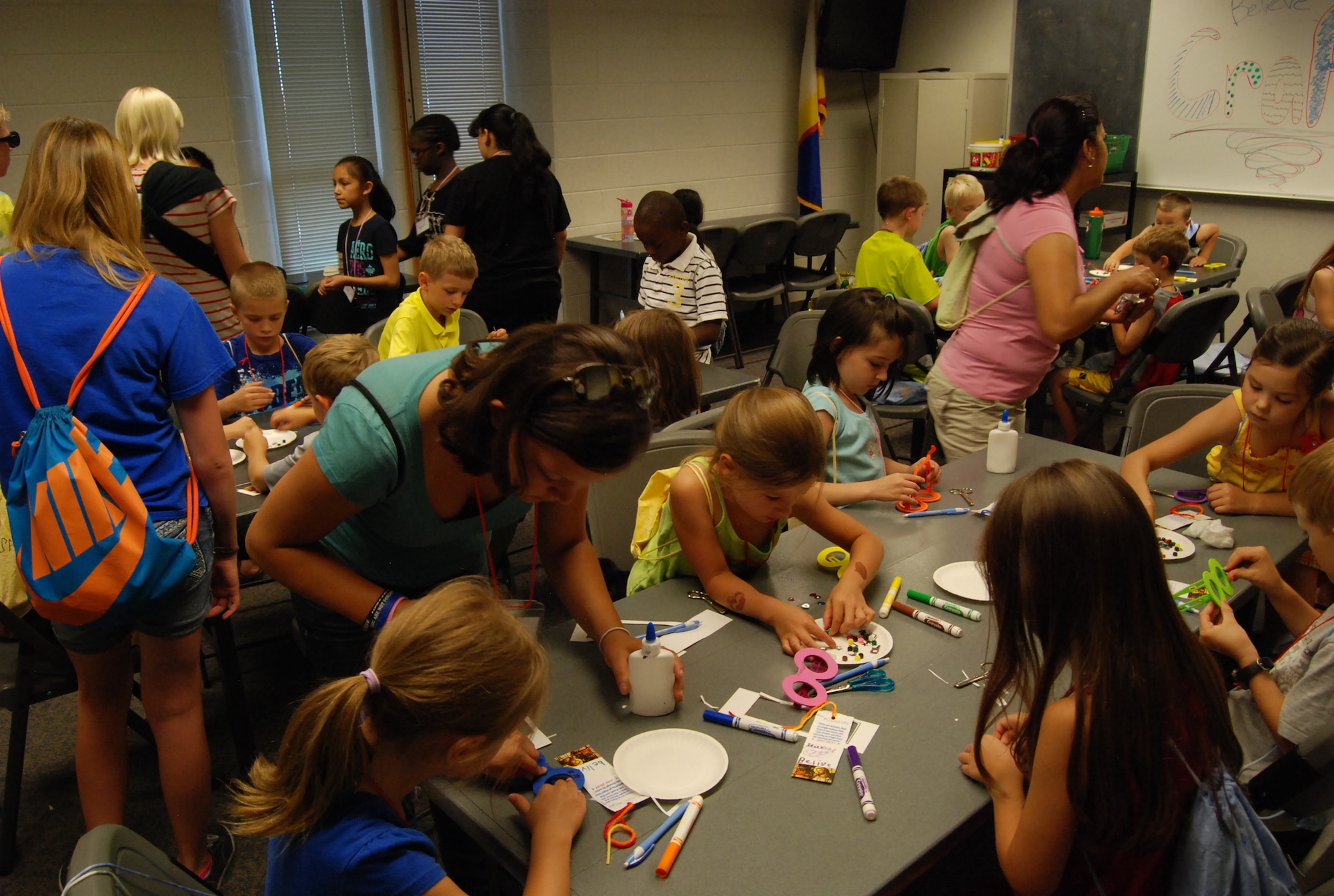 PETERSON AIR FORCE BASE, Colo. – More than 130 children from preschool through fifth grade attended this year’s vacation Bible school at the Peterson base chapel July 8-12. “Investigation Destination” was the theme for this year’s VBS which offered the children a fun and active experience blended with biblical teachings. The one-week summer event began every morning with a Bible story shared with the children, who afterwards broke into age-appropriate classes for a full day of investigation-themed experiments, crafts, games and other activities. (U.S. Air Force photo/Michael Golembesky)