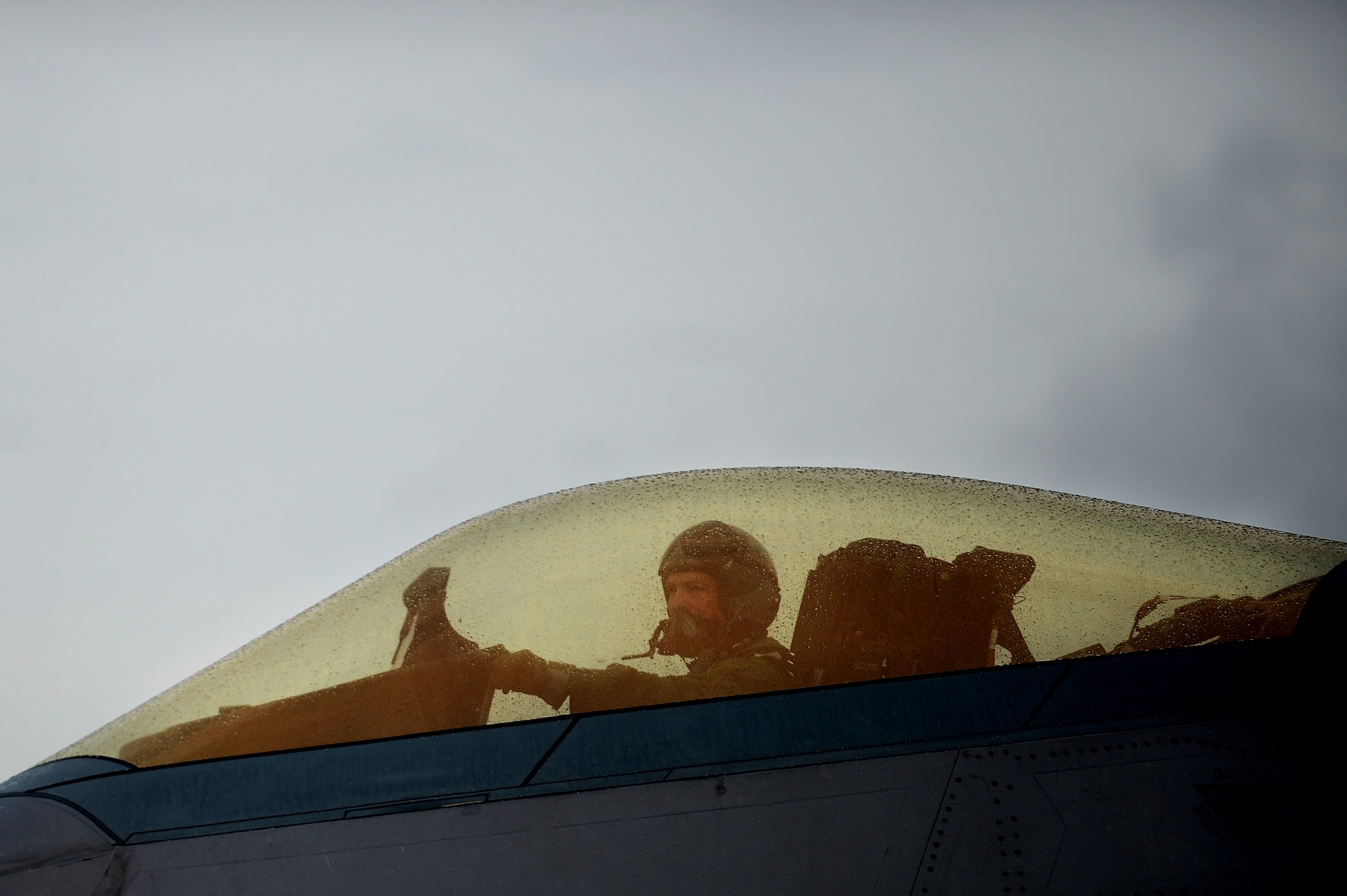 U.S. Air Force Col. Kevin J. Robbins, 1st Fighter Wing commander, taxis down the runway in an F-22 Raptor during his “fini flight” at Langley Air Force Base, Va., July 12, 2013. Robbins assumed command of the 1st FW in May 2011 after serving in Kabul, Afghanistan. (U.S. Air Force photo by Senior Airman Kayla Newman/Released)