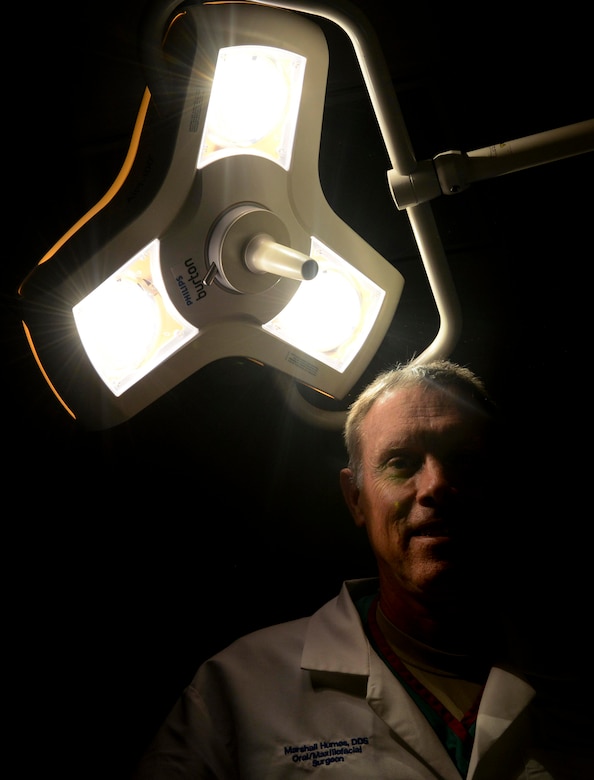 U.S. Air Force Dr. (Lt. Col.) Marshall Humes, 633rd Dental Squadron oral and maxillofacial surgeon, inspects one of the clinic’s dedicated treatment rooms in U.S. Air Force Hospital Langley, at Langley Air Force Base, Va., July 10, 2013. Humes said the oral surgeons benefit greatly by having the ability to take advantage of the hospital’s unique environment with fellow surgical and specialty care providers within arm’s reach. (U.S. Air Force photo by Airman 1st Class R. Alex Durbin/Released)