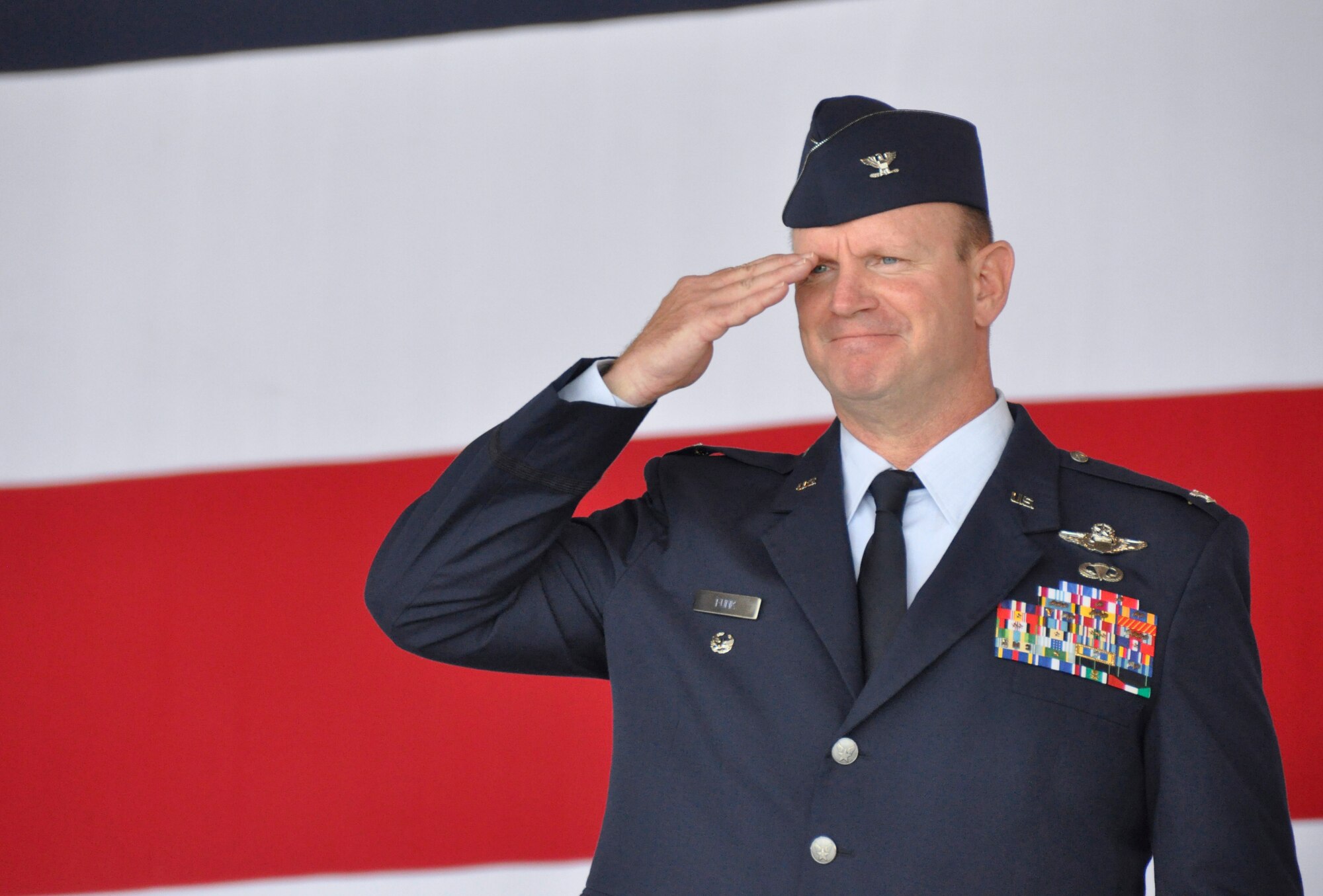 Col. Christian G. Funk, new 482nd Fighter Wing commander, salutes during the 482nd FW change of command ceremony at Homestead Air Reserve Base, Fla., July 14. (U.S. Air Force photo/Senior Airman Jaimi Upthegrove)