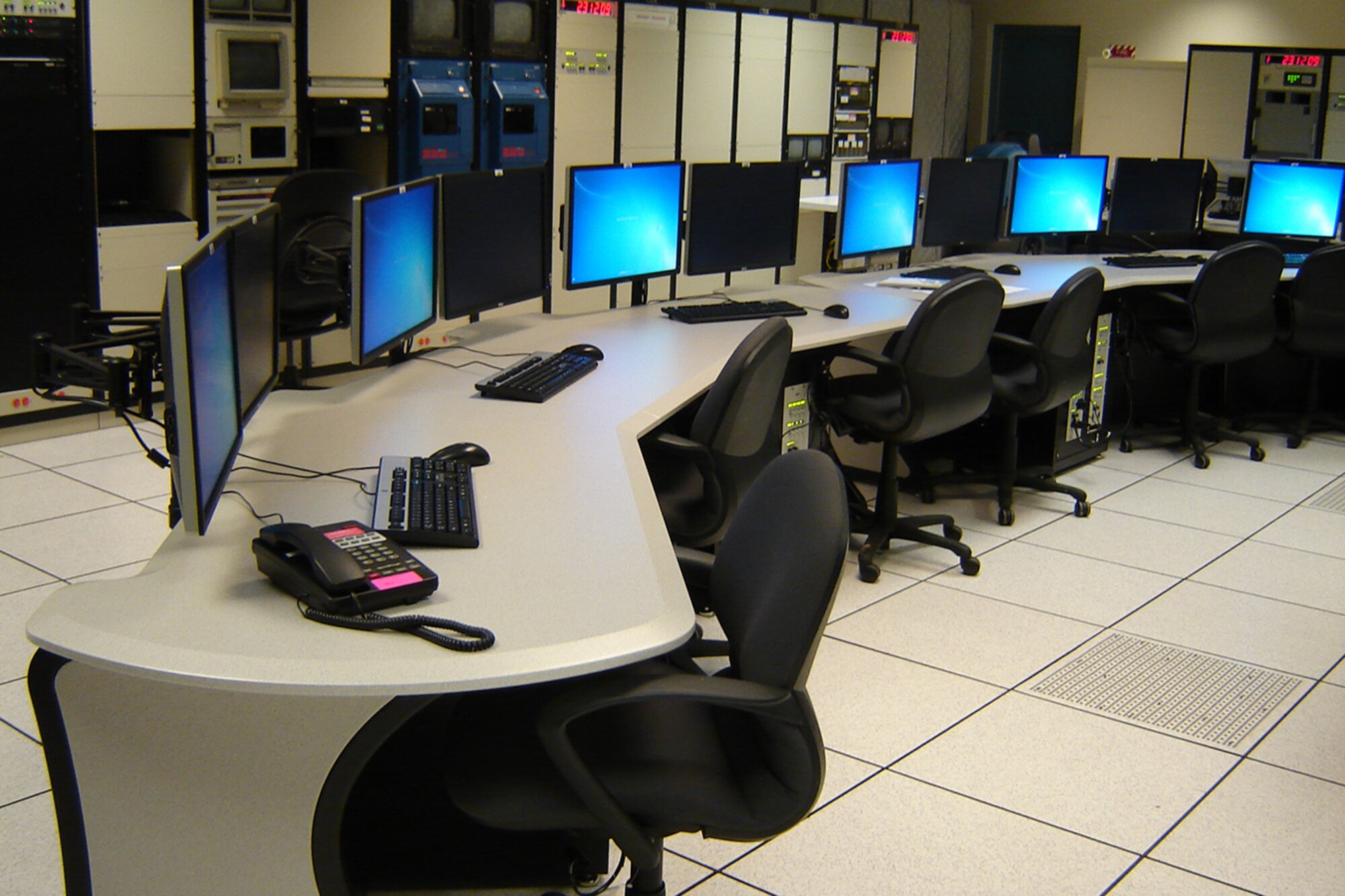 Before & After: Arnold Engineering Development Complex’s (AEDC) Large Rocket Motor Test Facility (J-6) control room (bottom, after) is equipped with state-of-the-art software and hardware for its new Facility Control System. The system offers improved interfaces for the customer and operator. (AEDC Photos)
