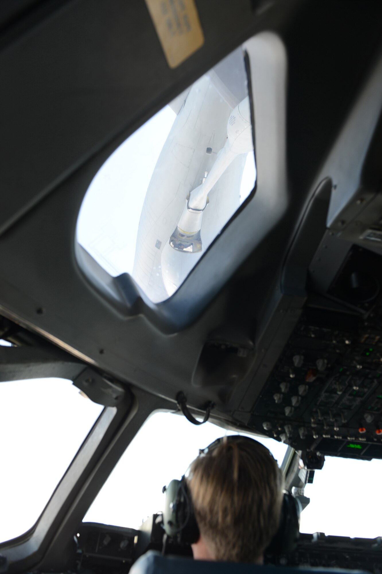 Col. Wyn Elder, 62nd Airlift Wing commander, practices air refueling during his "fini flight" July 15, 2013 at Joint Base Lewis-McChord, Wash. Elder also conducted low-level flying. (U.S. Air Force photo/Staff Sgt. Frances Kriss)