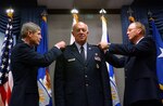 Lt. Gen. Harry M. Wyatt III, center, is pinned by Gens. Norton A. Schwartz, left, Air Force chief of staff, and Craig R. McKinley, chief of the National Guard Bureau, during a ceremony at the Pentagon, Monday, Feb. 2, 2009. Wyatt was recently named the director of the Air National Guard, and previously served as the adjutant general of the Oklahoma National Guard.