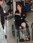 Tammy Duckworth, Illinois director of Veterans Affairs, speaks to community members before her presentation recognizing Disabilities Awareness Month in the Casablanca Room on Campbell Barracks in Heidelberg, Germany, Oct. 16.