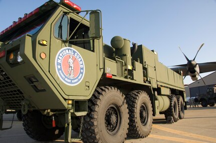 The California National Guard's two newly acquired Heavy Expanded Mobility Tactical Truck (HEMTT) based Water Tenders (HEWATT) feature all-wheel drive, 445 horsepower engines, 60 percent gradability, 2,500 gallon tanks and three-foot fording clearance. These fire fighting resources were on static display during a California National Guard press conference at McClellan Air Park, Calif., January 30, 2009.