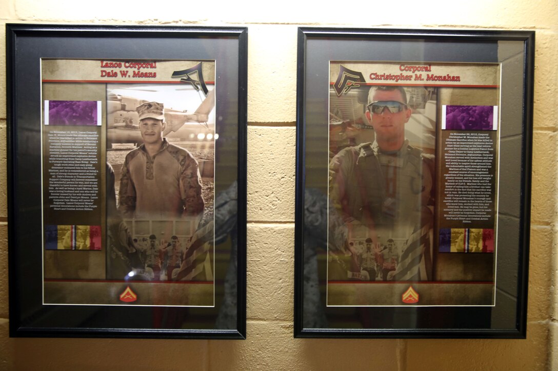 Two memorials are posted of Cpl. Christopher M. Monahan Jr. (right), and Lance Cpl. Dale W. Means (left), motor transportation operators with Transportation and Support Company, Combat Logistics Battalion 2, 2nd Marine Logistics Group, at the company motor pool aboard Camp Lejeune, N.C., July 15, 2013. Means and Monahan made the ultimate sacrifice in Helmand Province, Afghanistan, in November 2012 in support of Operation Enduring Freedom. 