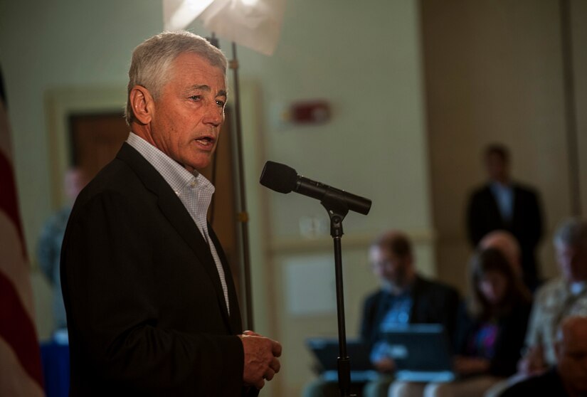 Secretary of Defense Chuck Hagel speaks with civilians July 17, 2013 during an open-discussion forum and a question-and-answer session at the Charleston Club at Joint Base Charleston- Air Base, S.C. Hagel is the 24th Secretary of Defense and the first enlisted combat veteran to lead the Department of Defense.  Hagel’s visit to JB Charleston included learning about flying and support operations conducted in the Air Force at Charleston, meeting with Boeing representatives to talk about what the company provides to the Air Force, and conducting a town hall meeting with Department of Defense civilian employees to discuss federal government sequestration and civilian worker furloughs in the department. (U.S. Air Force photo/Senior Airman Ashlee Galloway)