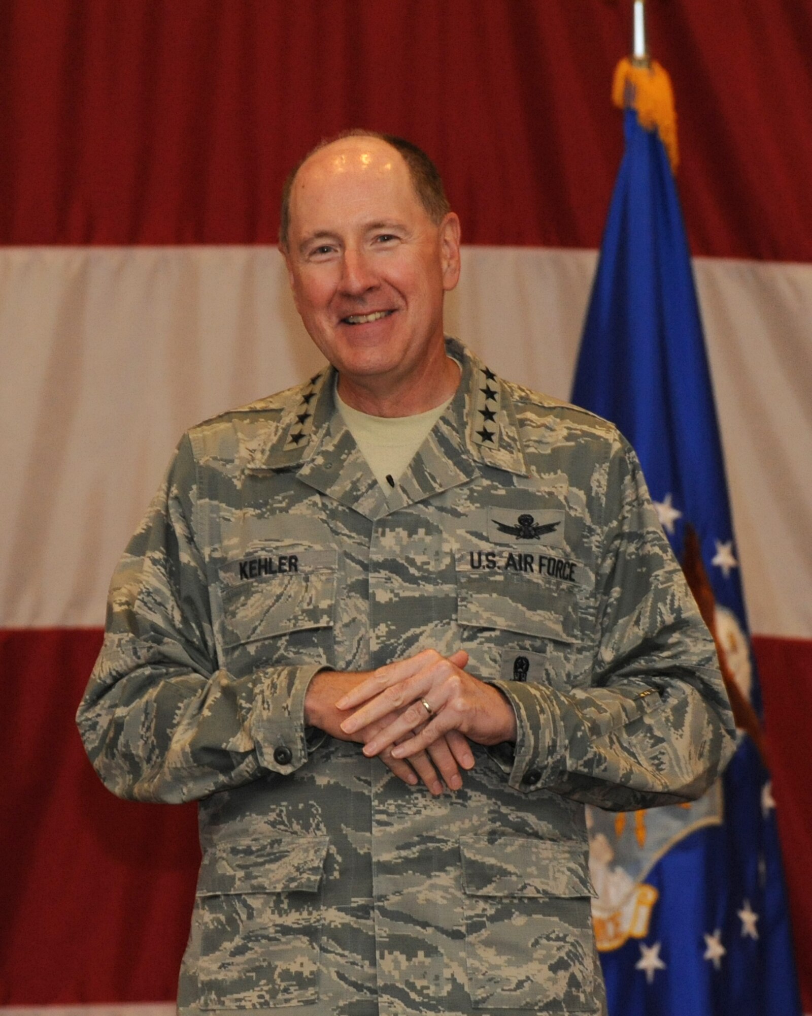 Gen. C. Robert Kehler, U.S.  Strategic Command commander, addresses Airmen of Air Force Global Strike Command during an All Call at Barksdale Air Force Base, La., July 16. Kehler also toured a B-52 static display, received mission briefings and met with 2nd Bomb Wing and Headquarters AFGSC leaders during his visit to Barksdale. (U.S. Air Force photo/Airman 1st Class Jannelle Dickey)
