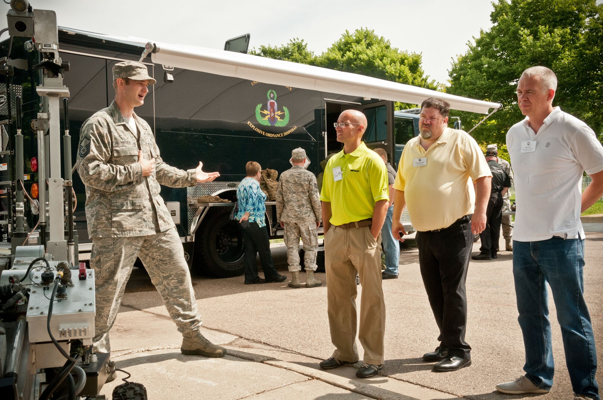 Master Sgt. Steven Hager, 934th Civil Engineering Squadron explosive ordnance disposal, demonstrates an EOD robot to (left to right) Steven Sachs, Christopher Dwyer, and Mark Olson, Honorary Commanders, during a tour of the 934th Airlift Wing.  The HC program helps strengthen community partnerships with the 934 AW, Minneapolis-St. Paul Air Reserve Station, Minn.  (U.S. Air Force photo/MSgt. Scott Farley)