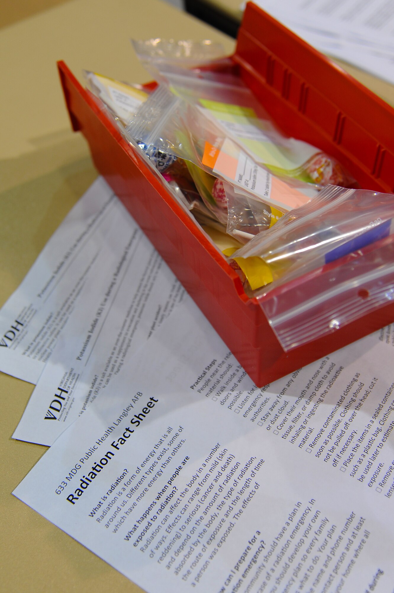 In the event of a real-world nuclear disaster, potassium iodide, a medication used to prevent absorption of radioactive iodide, would be distributed at Langley Air Force Base, Va., July 16, 2013. The medication is acquired through the Strategic National Stockpile and is used to help prevent cancer and other diseases. (U.S. Air Force photo by Airman 1st Class Victoria H. Taylor/Released)