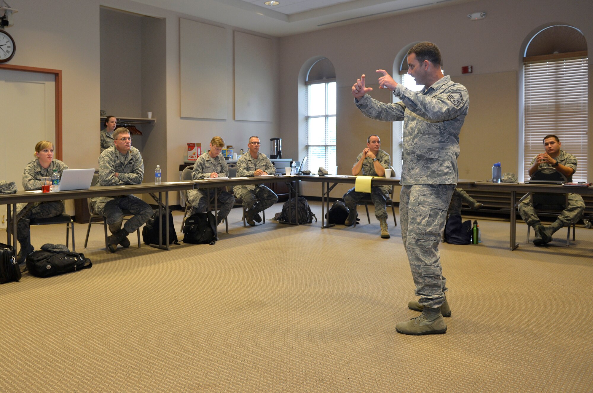 MCGHEE TYSON AIR NATIONAL GUARD BASE, Tenn. – Senior Master Sgt. Shaun Withers, career field manager for National Guard Bureau public affairs, speaks with Air National Guard public affairs students in the Public Affairs Managers Course at the I.G. Brown Training and Education Center here, July 16, 2013, about marketing official photography. (U.S. Air National Guard photo by Master Sgt. Kurt Skoglund/Released)