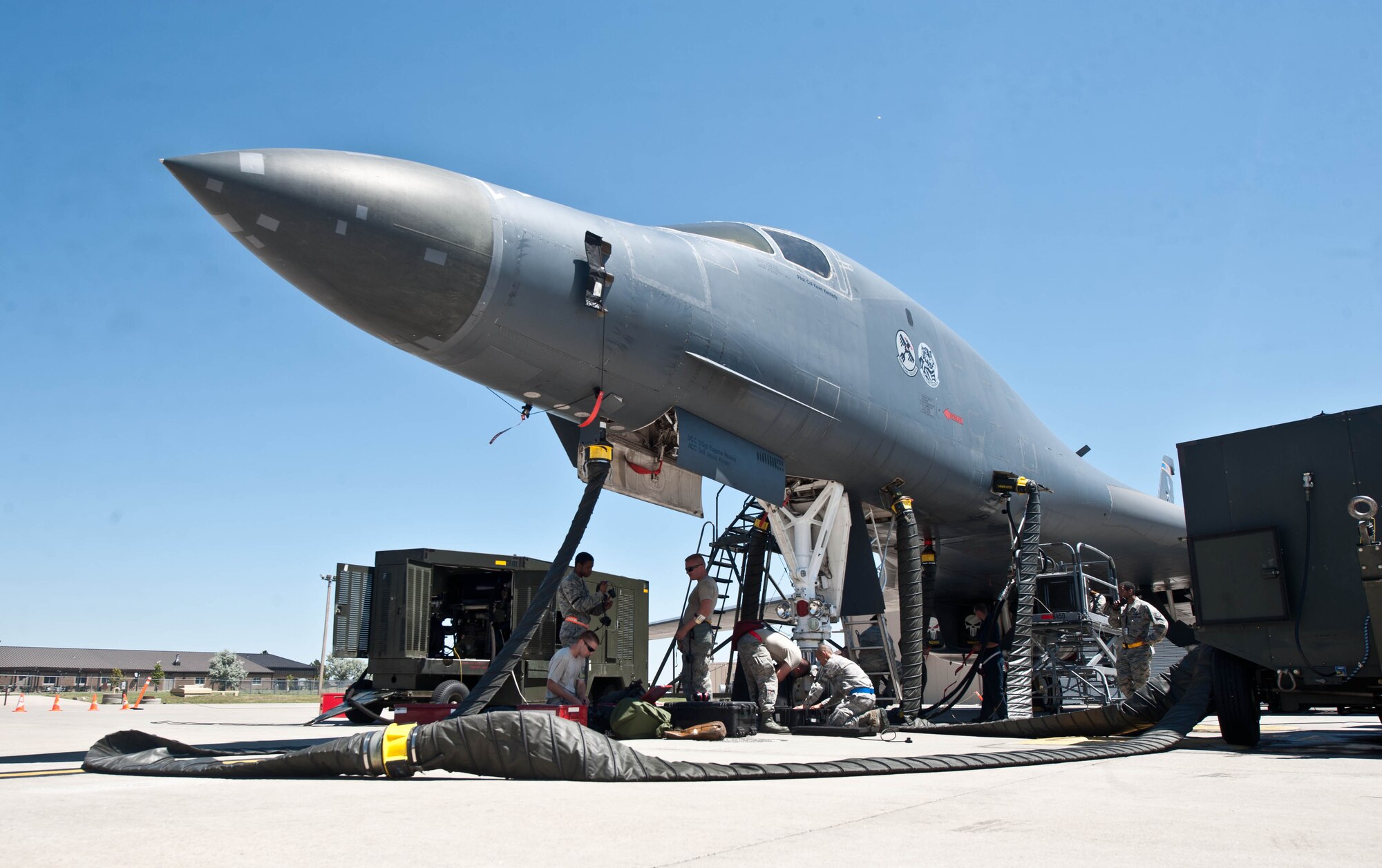 A B-1 bomber undergoes trouble shooting procedures from Airmen assigned to the 28th Aircraft Maintenance Squadron during the Phase II portion of an operational readiness exercise at Ellsworth Air Force Base, S.D., July 10, 2013. The ORE covered a wide range of operations and was designed to test Airmen’s ability to deploy personnel, aircraft and equipment. (U.S. Air Force photo by Airman 1st Class Zachary Hada/Released)
