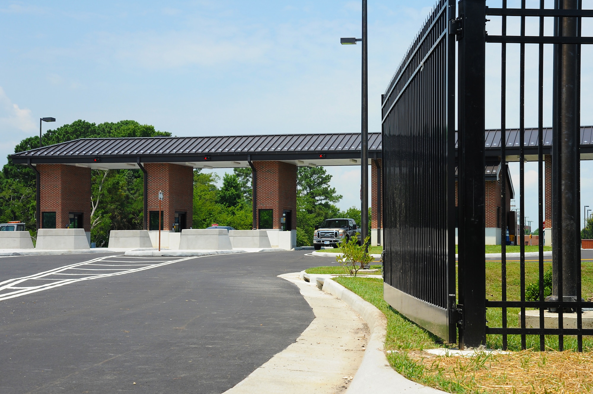 The LaSalle Avenue Gate at Langley Air Force Base, Va., is scheduled to reopen at 11 a.m, July 19, following a ribbon-cutting ceremony at 9:30 a.m. The gate construction features a new visitor control center, expanded guardhouse and new pass and identification office. (U.S. Air Force photo by Airman 1st Class Victoria H. Taylor/ Released)