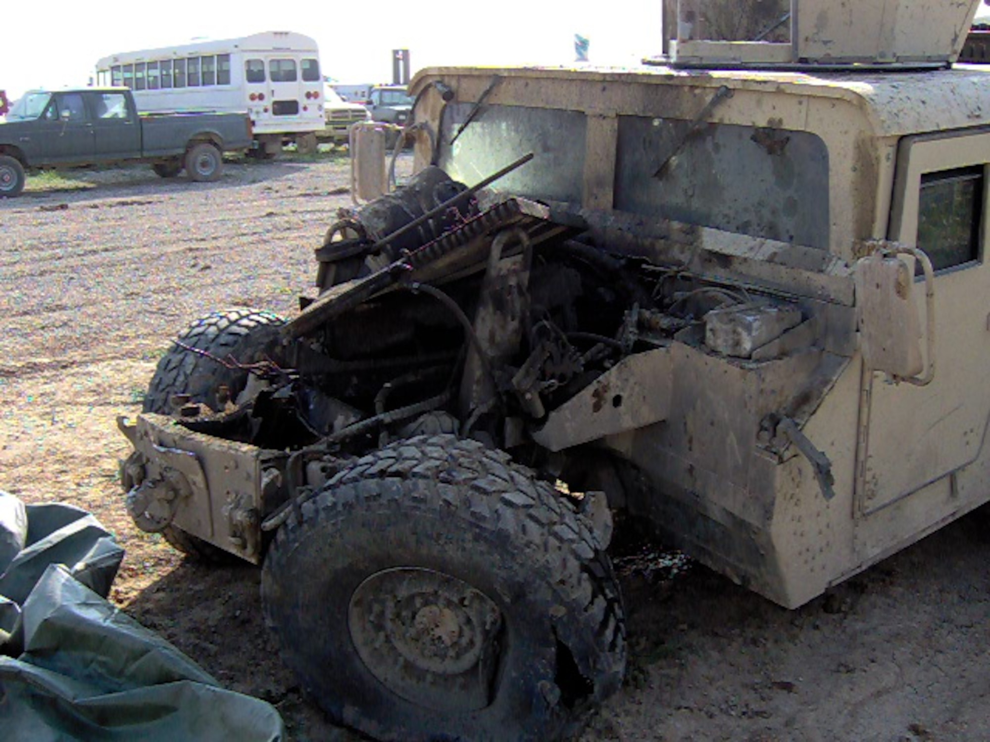This Humvee drove over a pressure-plated improvised explosive device in Iraq March 19, 2005, with four Airmen inside. The IED detonated underneath the left front tire, blowing up the engine and hurling the vehicle and its passengers, including Tech. Sgt. Kellen Grogan, 10 feet in the air and 15 feet forward. All passengers survived the explosion. (courtesy photo) 