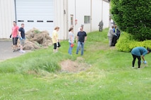 Wing personnel join in on an afternoon, base-wide cleanup project here on May 23. A broad spectrum of repair, beautification and equipment relocation projects were addressed immediately following the morning’s 101 critical days of summer briefings from Lt. Col. Scott Hreso, the wing’s chief of safety officer. Everyone really pitched in to make the day a true success again, said Hreso. We hope to hold this kind of self-help program two times a year he added.