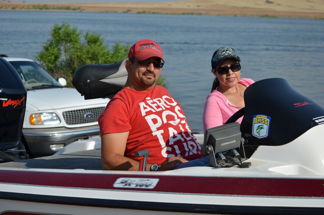 Two members of a local fishing club smile prior to the start of Take a Warrior Fishing 2013 at Success Lake, a U.S. Army Corps of Engineers project near Porterville, Calif.