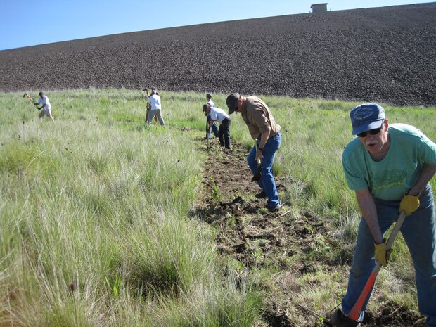 National Trails Day 2011 volunteers clearing a trail in order to re-route a badly eroding trail at Bennington Lake.